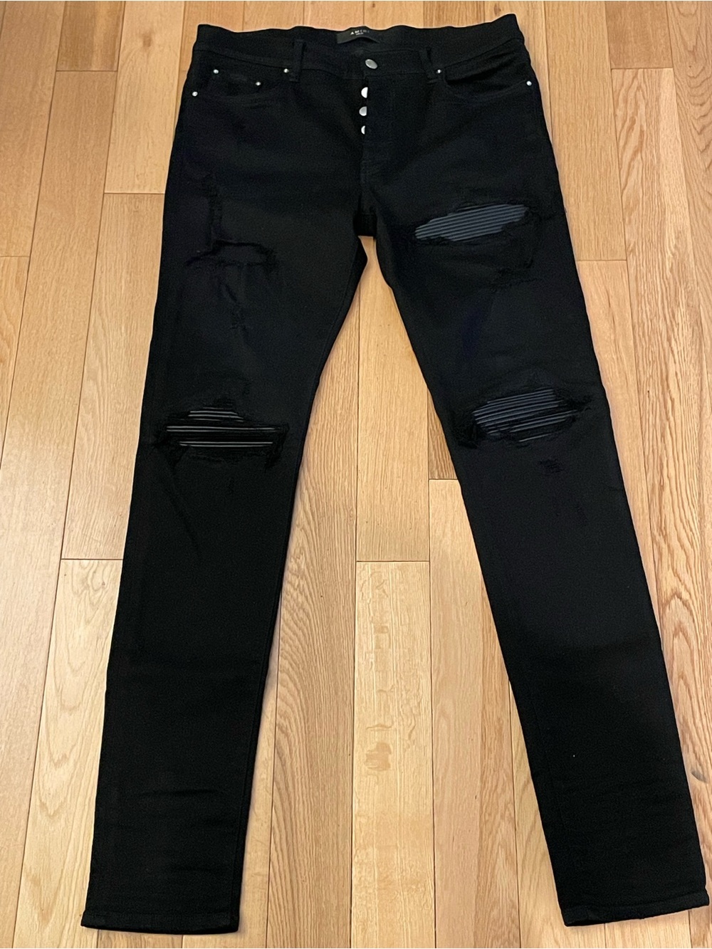 AMIRI Black Distressed Skinny Jeans